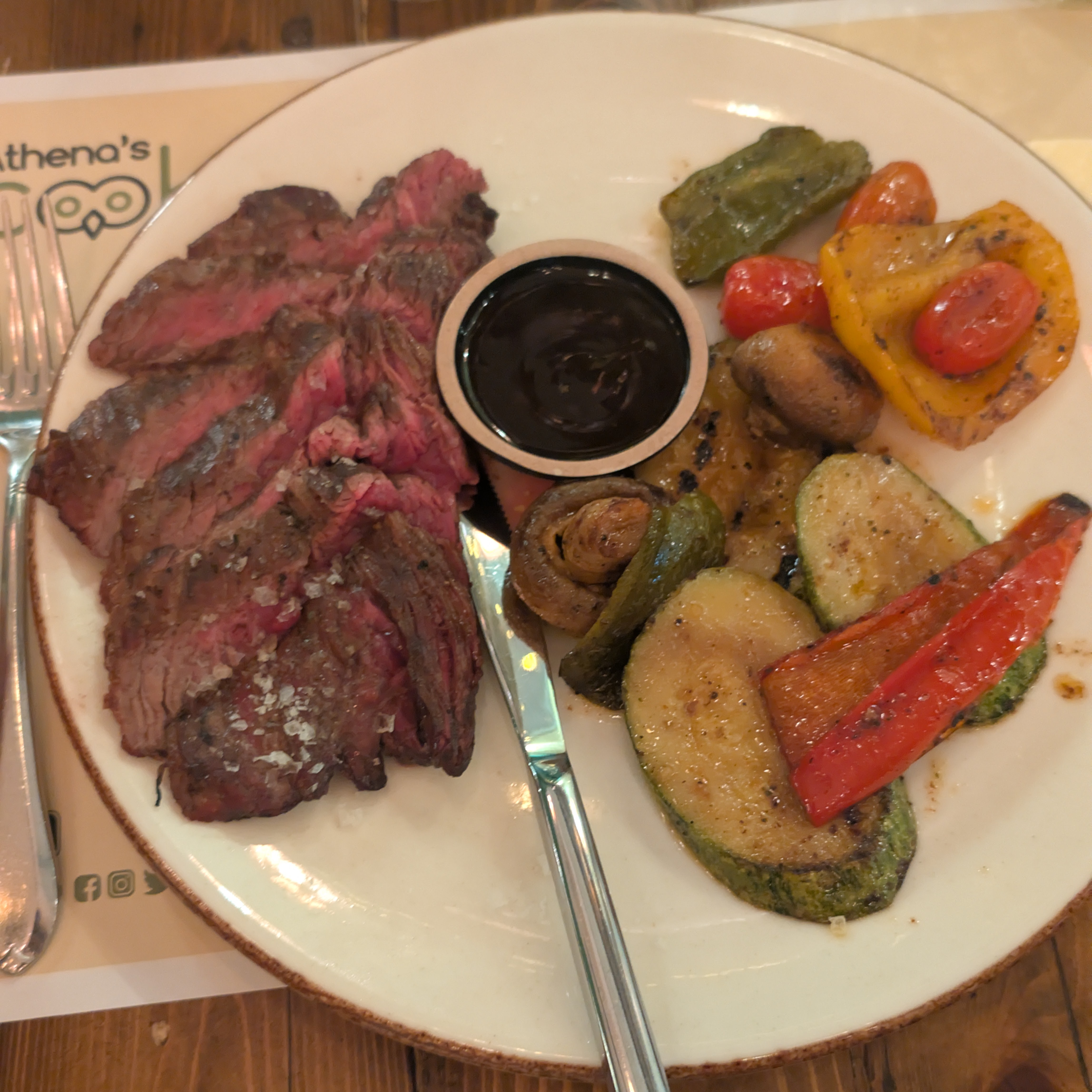 Steak with grilled vegetables at Athena's Cook